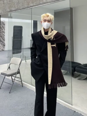 Oversized black double-breasted blazer with wide-leg trousers and fringe scarf for Seoul-inspired streetwear styling