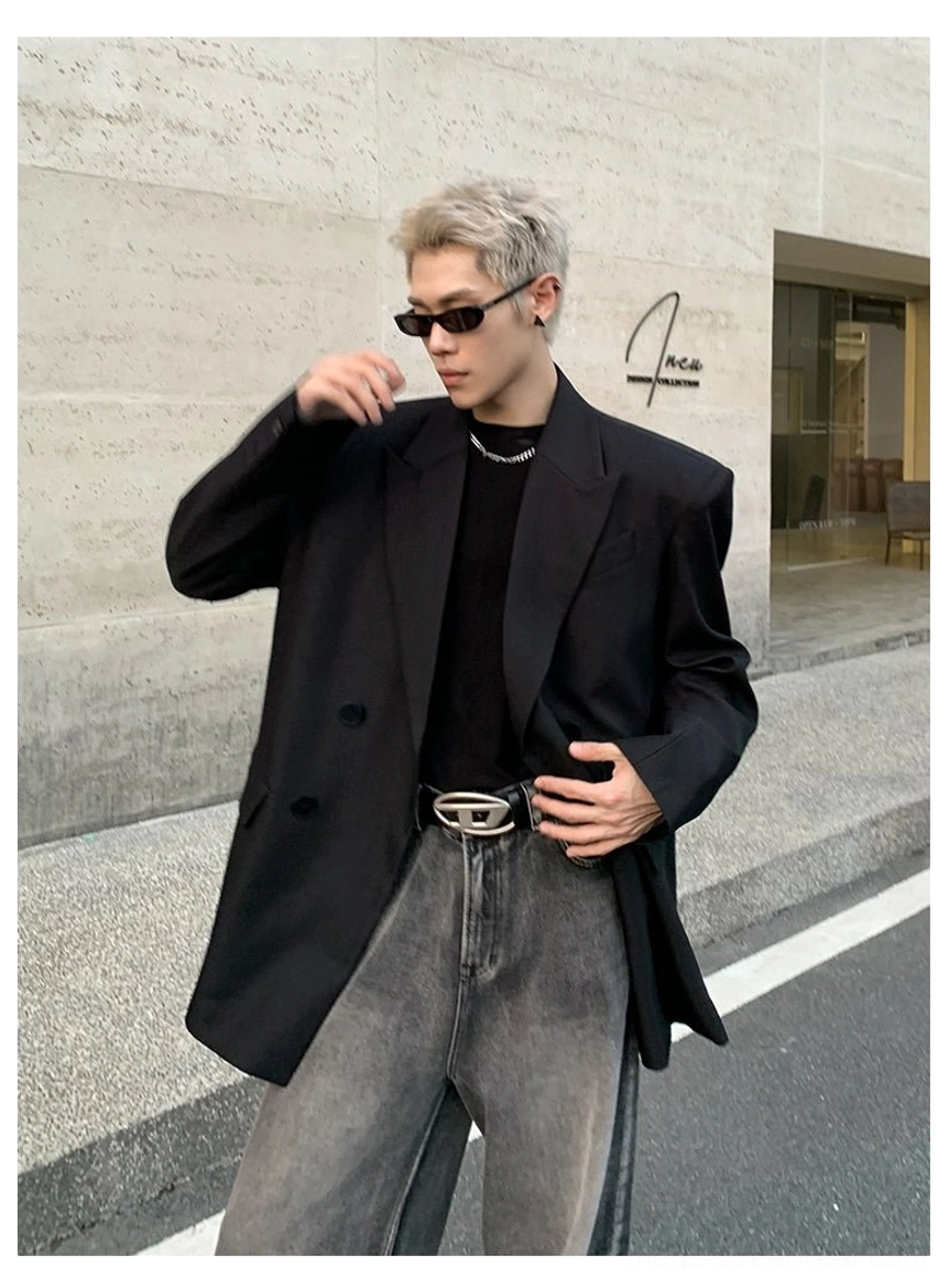 Oversized black double-breasted Korean streetwear blazer with structured tailoring and relaxed longline fit