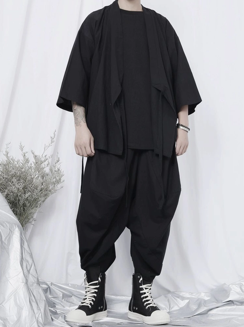 Oversized black kimono shirt with wrap front, wide sleeves, and adjustable side tie straps for modern Asian streetwear