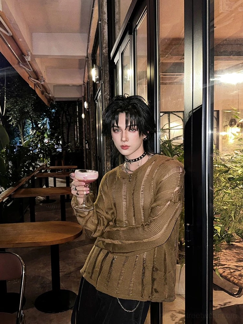 Full front view of an oversized brown yellow sheer knit sweater with ripped vertical stripes and crew neck styled for Korean streetwear