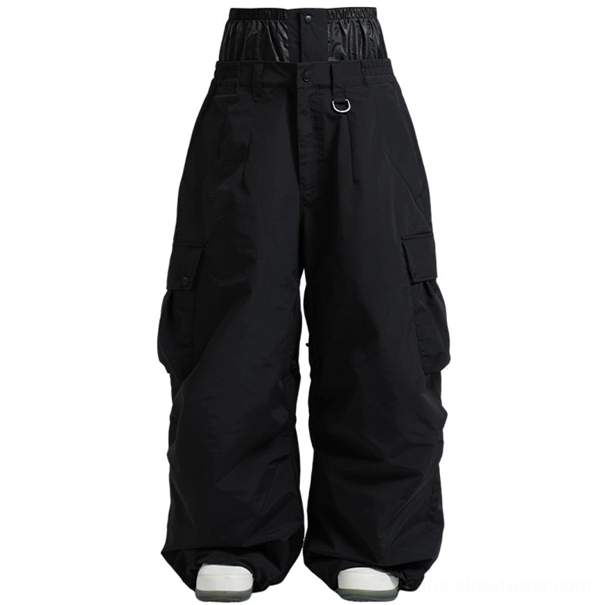 Black waterproof cargo snow pants front view with high waist elastic waistband and multiple utility pockets