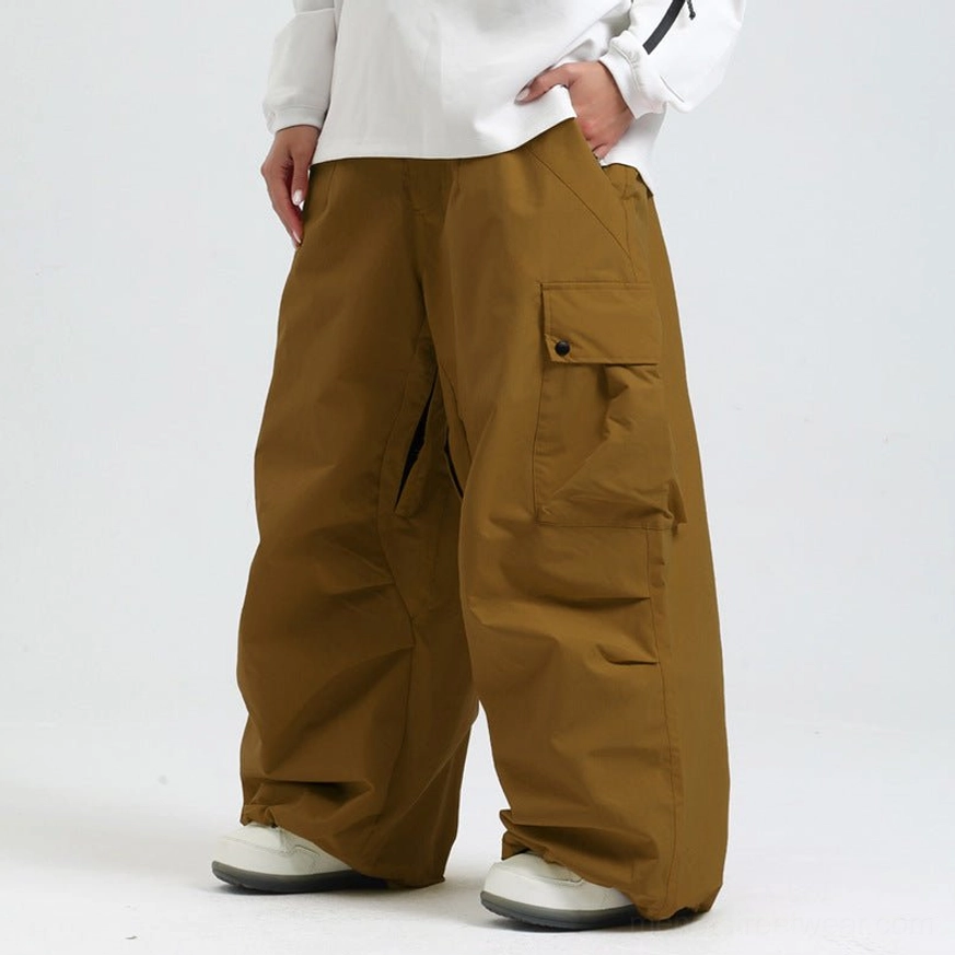Oversized cargo snow pants product image featuring relaxed waterproof techwear fit and utility pocket design
