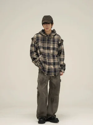 Oversized dark plaid flannel hooded shirt streetwear outfit with cargo pants front view