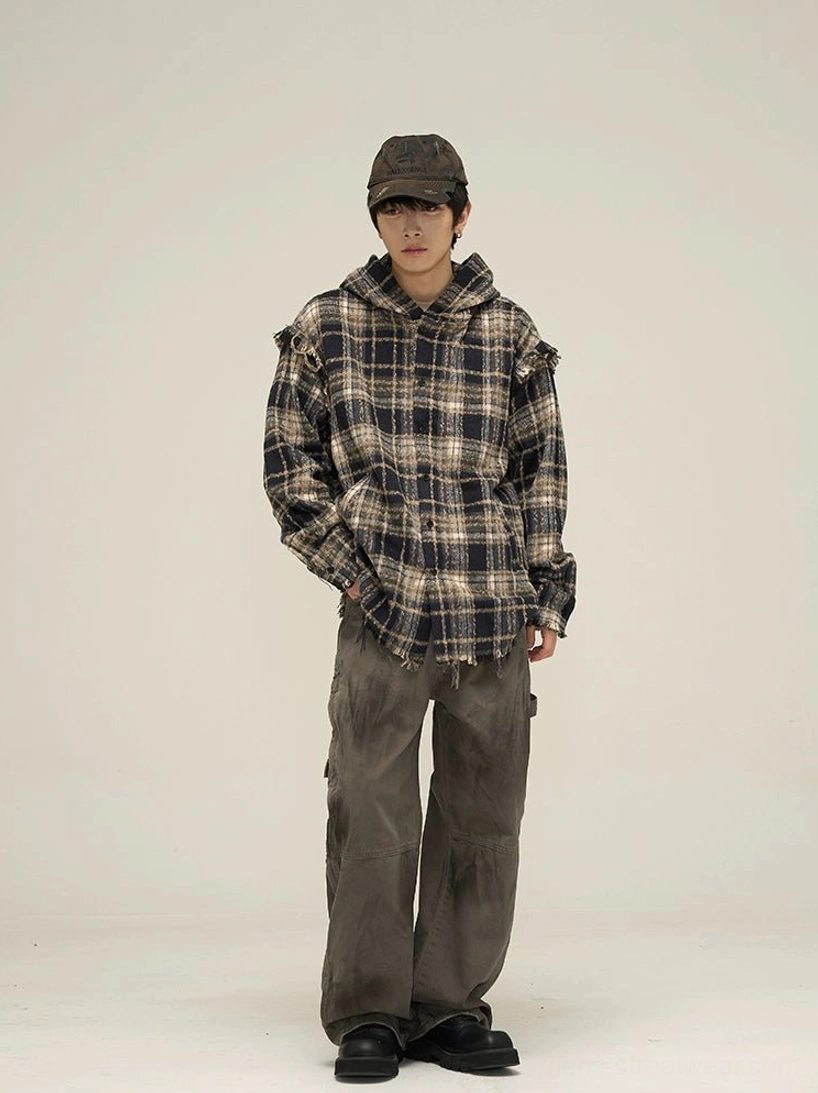 Oversized dark plaid flannel hooded shirt streetwear outfit with cargo pants front view