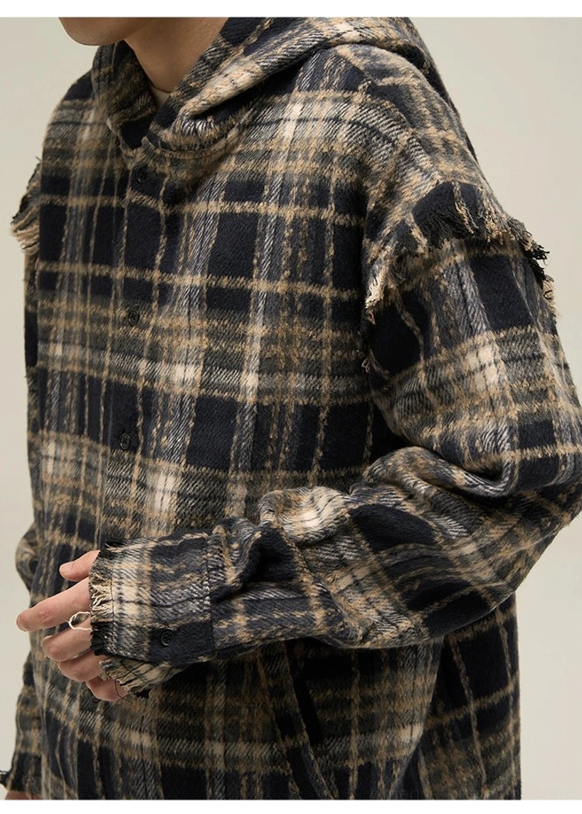 Side close-up of dark plaid cat ear flannel hooded shirt with frayed shoulder seam details