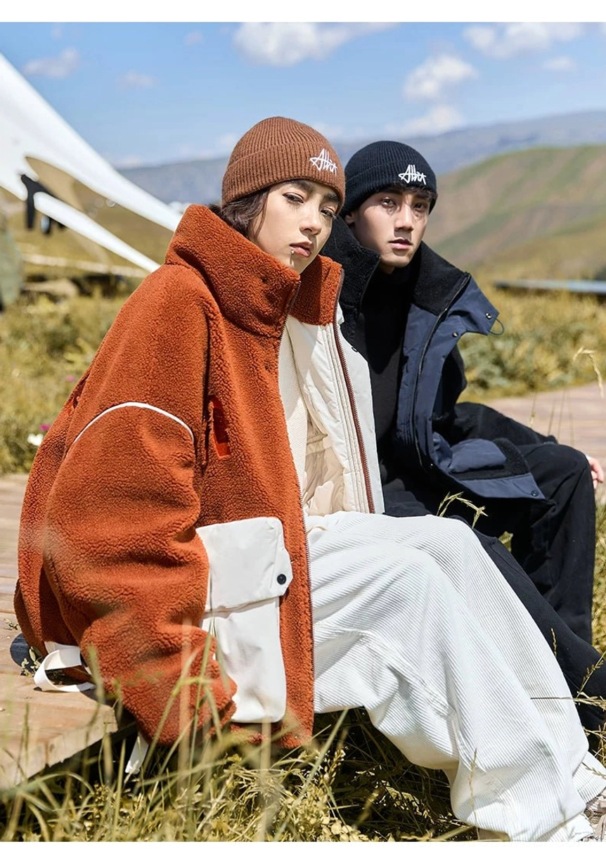 Oversized contrast sherpa fleece jacket worn during a casual camping and outdoor streetwear scene
