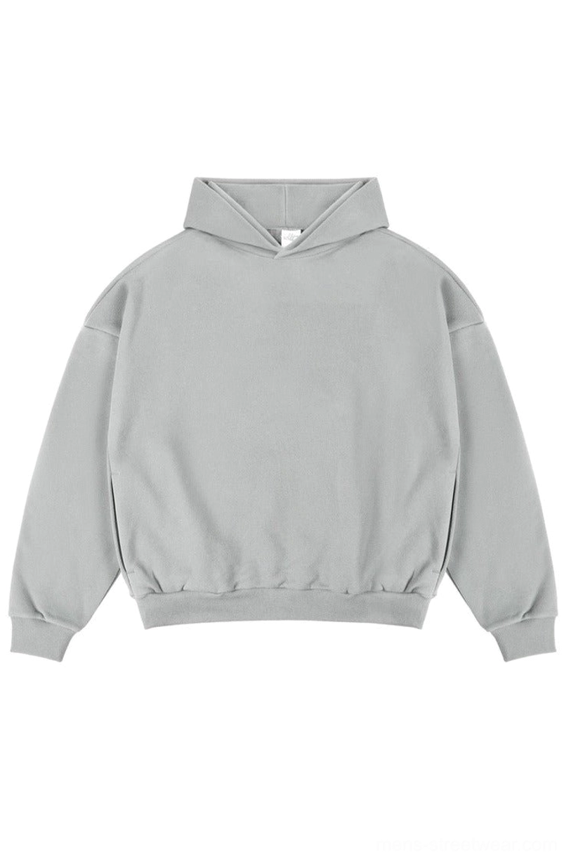 Light gray oversized cotton French terry hoodie with drop shoulders and ribbed trims