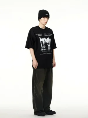Black oversized crowd reflection graphic T-shirt left side full-body streetwear outfit view