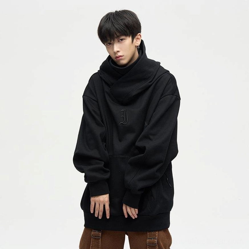Black oversized dual-layer high-neck hoodie front three-quarter streetwear look paired with brown cargo pants