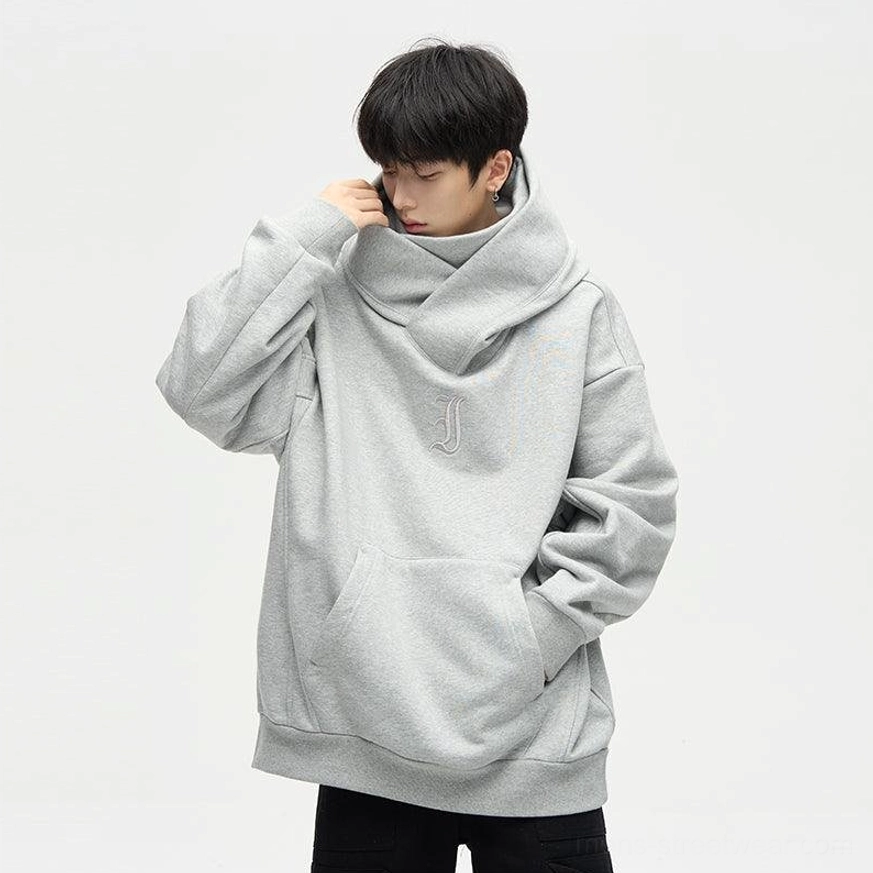 Gray oversized dual-layer high-neck hoodie front three-quarter view showing wrap-around hood and kangaroo pocket