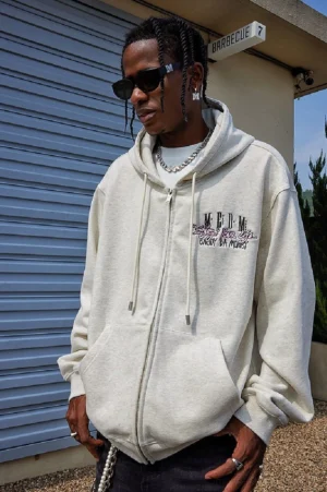 Heather gray oversized graphic zip-up hoodie shown in a three-quarter front view with drawstring hood, graffiti chest artwork, and relaxed Korean streetwear fit