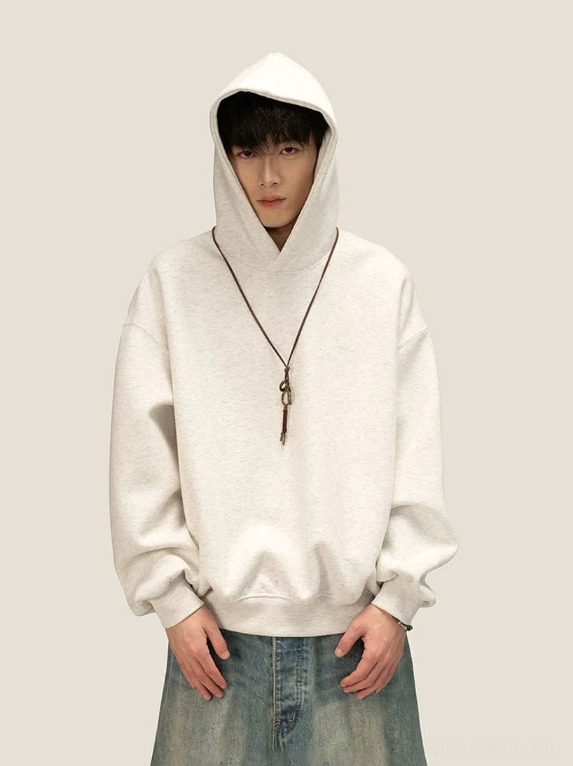 Oversized off-white heathered fleece hoodie with roomy drawstring hood and relaxed Korean streetwear fit