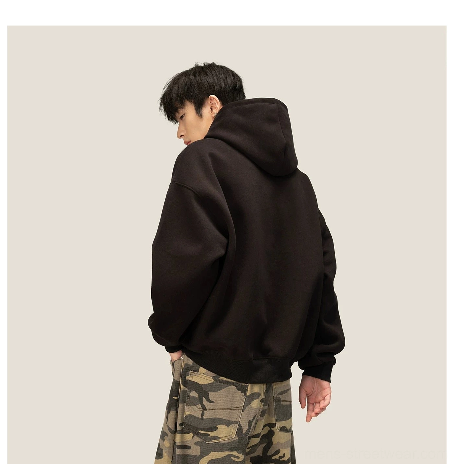 Oversized fleece hoodie product image showing relaxed pullover construction and contemporary Korean streetwear proportions