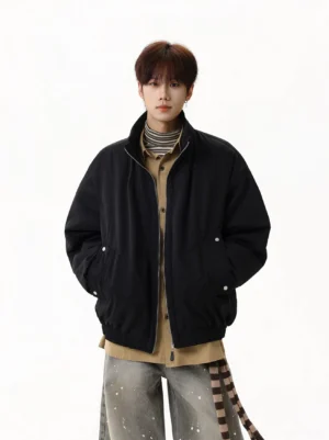 Black oversized fleece-lined stand collar streetwear jacket front full body view with relaxed dropped shoulder fit