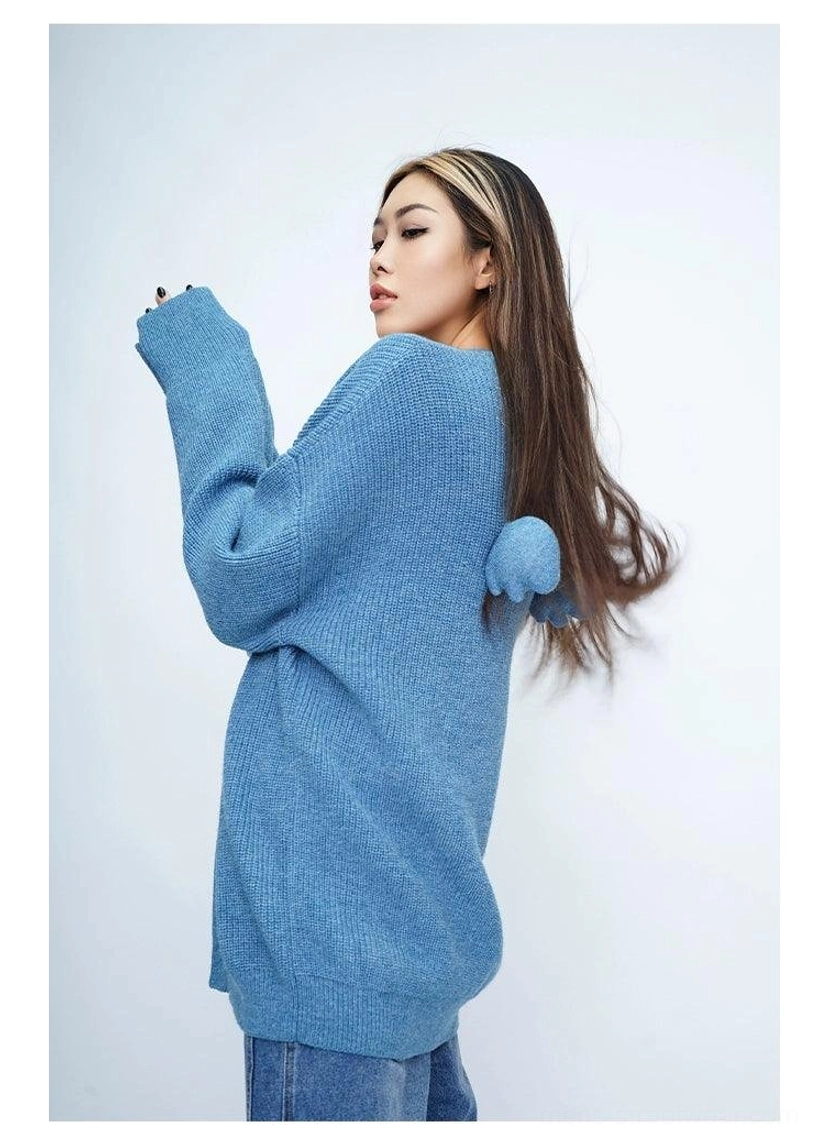 Oversized fuzzy knit cardigan with wing-shaped pom-pom back detail and relaxed Korean streetwear silhouette