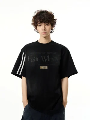 Front view of black oversized graphic sport T-shirt with layered chest lettering and white striped short sleeves