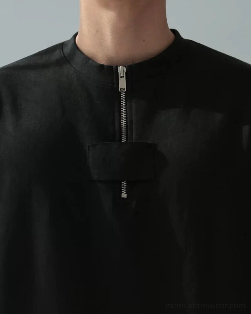 Black oversized half-zip cotton tee with utility chest panel for modern Korean streetwear outfits