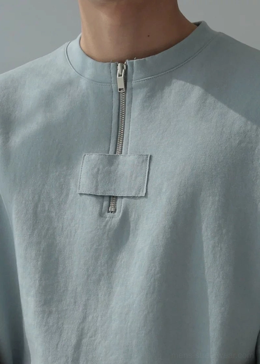 Hazy blue oversized half-zip cotton tee product image with relaxed boxy Korean streetwear silhouette