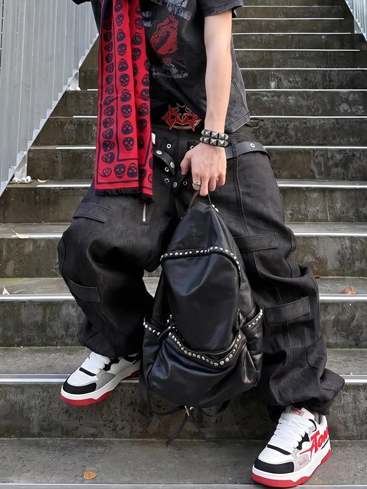 Low angle view of colorblock court sneakers worn with relaxed Korean streetwear cargo pants