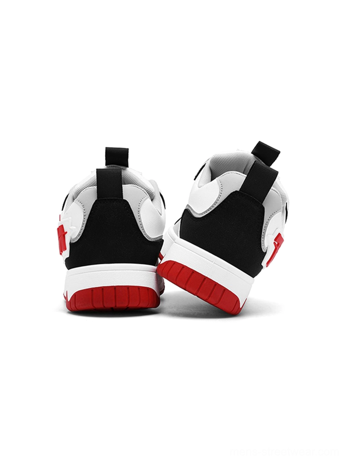Rear view of colorblock court sneakers showing red rubber outsole and contrasting heel panels