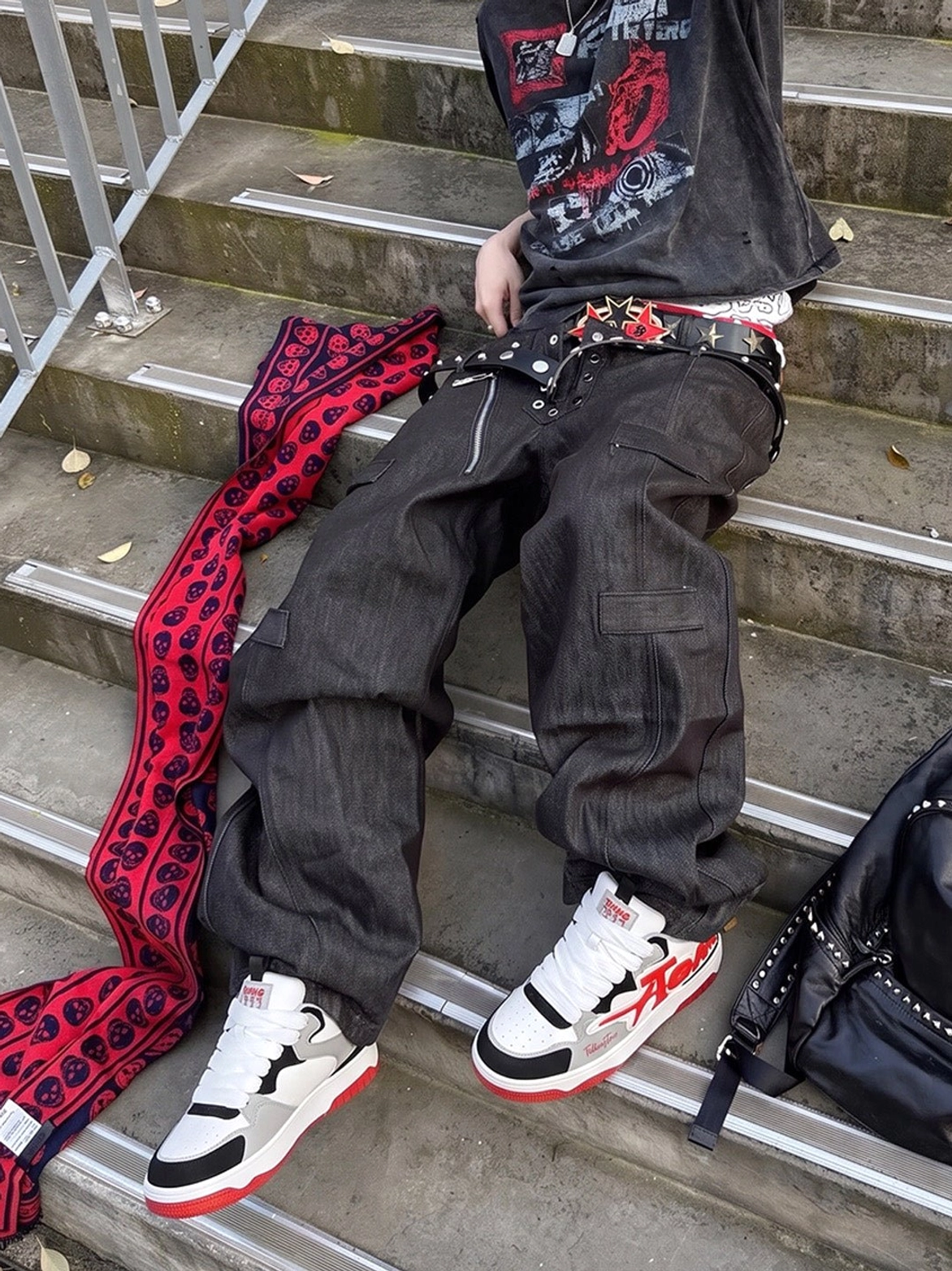 Oversized letter colorblock court sneakers styled with baggy cargo pants and graphic streetwear outfit