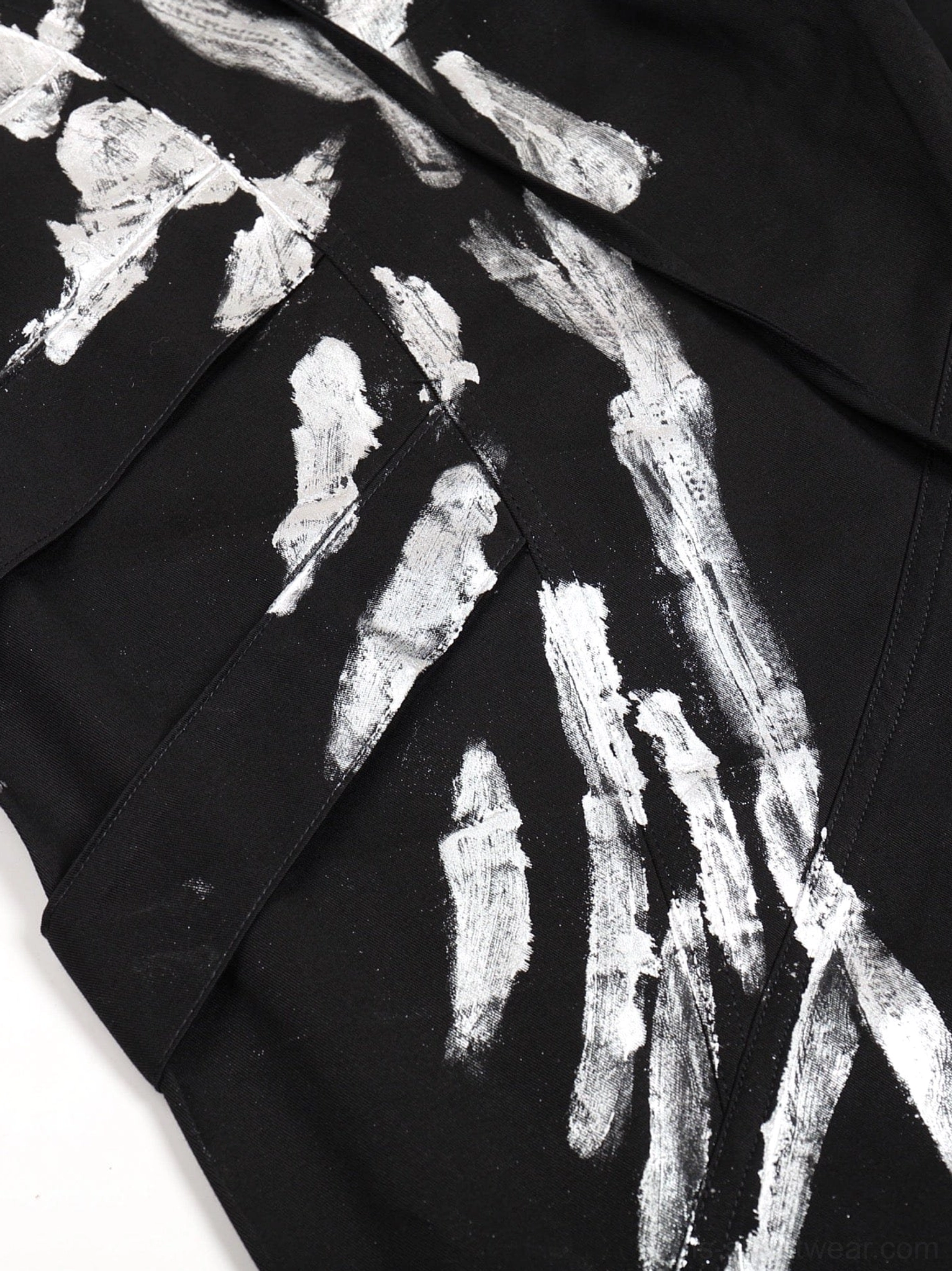 Oversized metallic strap cargo pants product image with utility pocket styling and futuristic Seoul fashion influence