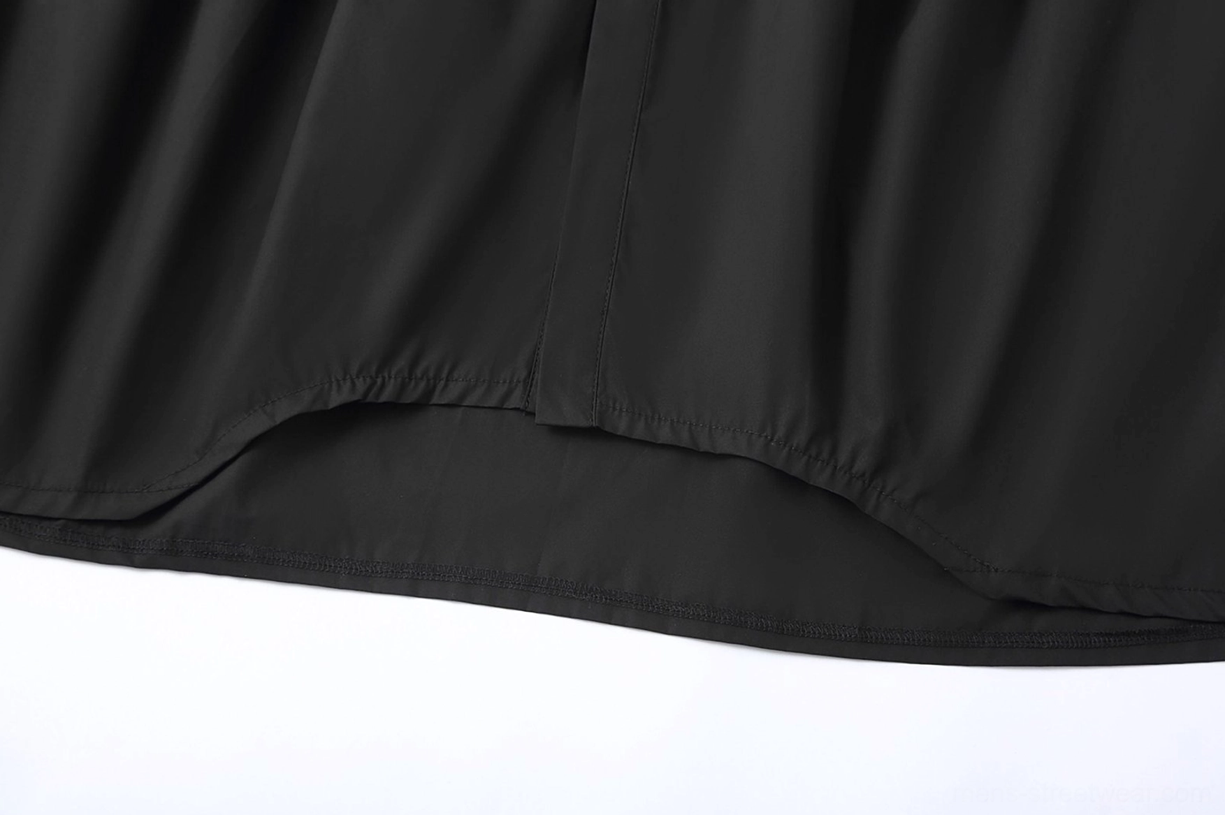 Oversized minimalist poplin shirt with structured cotton texture and contemporary Korean fashion proportions
