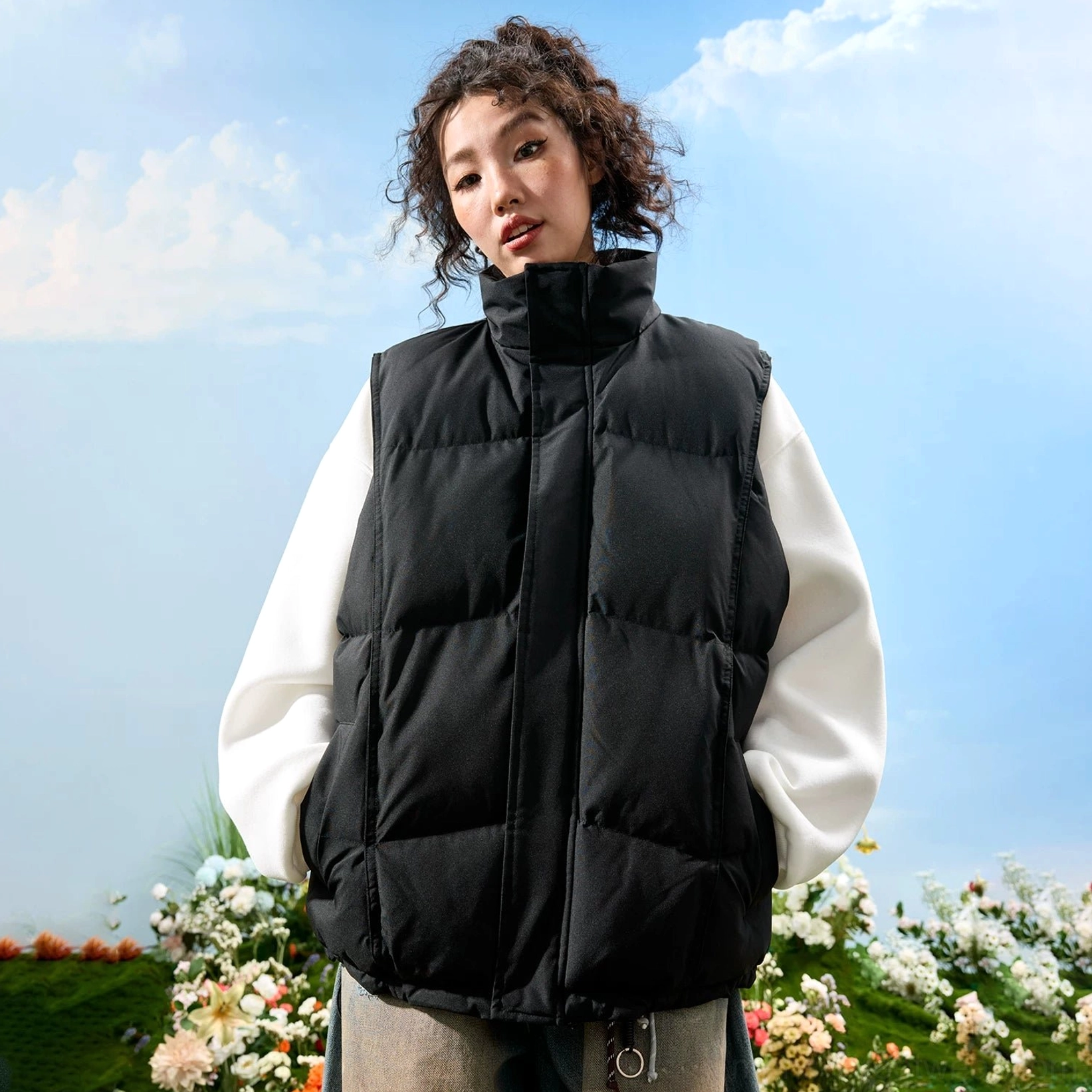 Oversized quilted puffer vest with high stand collar in a versatile unisex Korean streetwear layering style