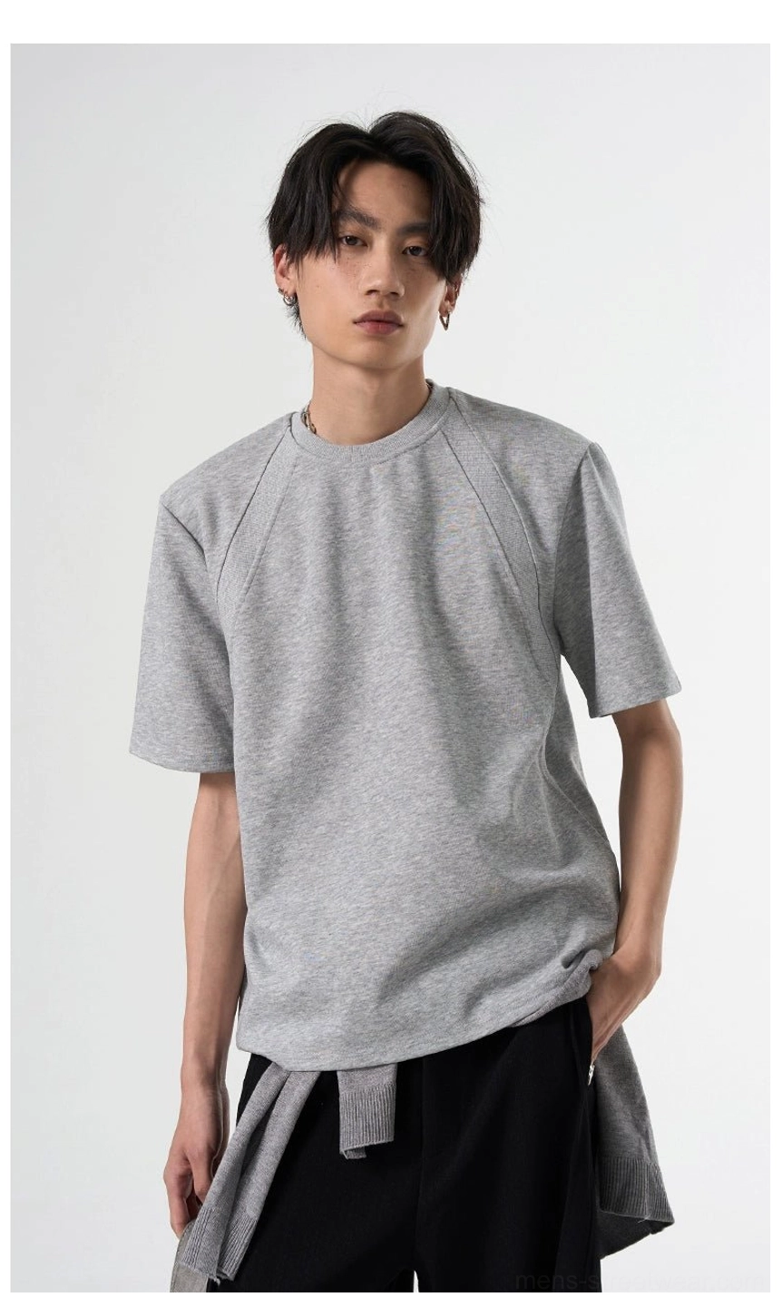 Heather gray relaxed fit raglan T-shirt with ribbed crew neck styled with black layered-hem wide-leg trousers