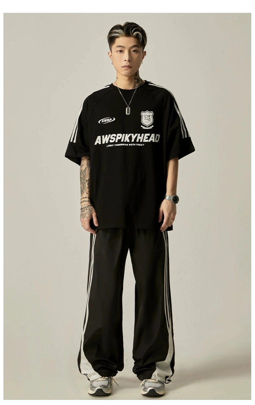 Oversized raglan athletic tee authenticity shot displaying brand authenticity markers and quality construction elements