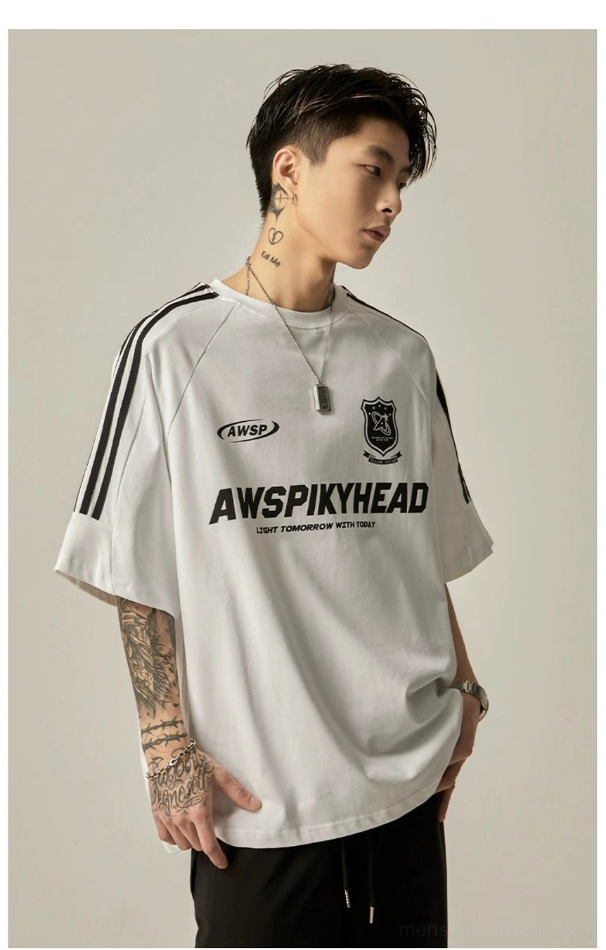 Oversized raglan athletic graphic tee showing graphic print quality and chest logo placement on heather grey fabric