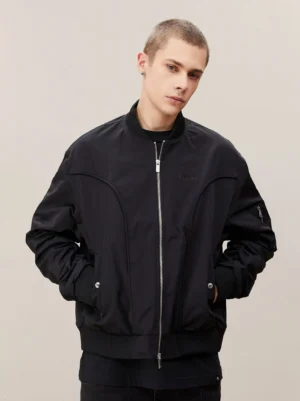 Black oversized ribbed MA-1 bomber jacket with front zipper and ribbed collar shown on male model