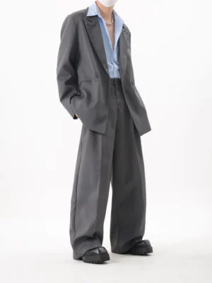 Gray Korean streetwear oversized blazer and wide-leg tailored trousers side profile styling view