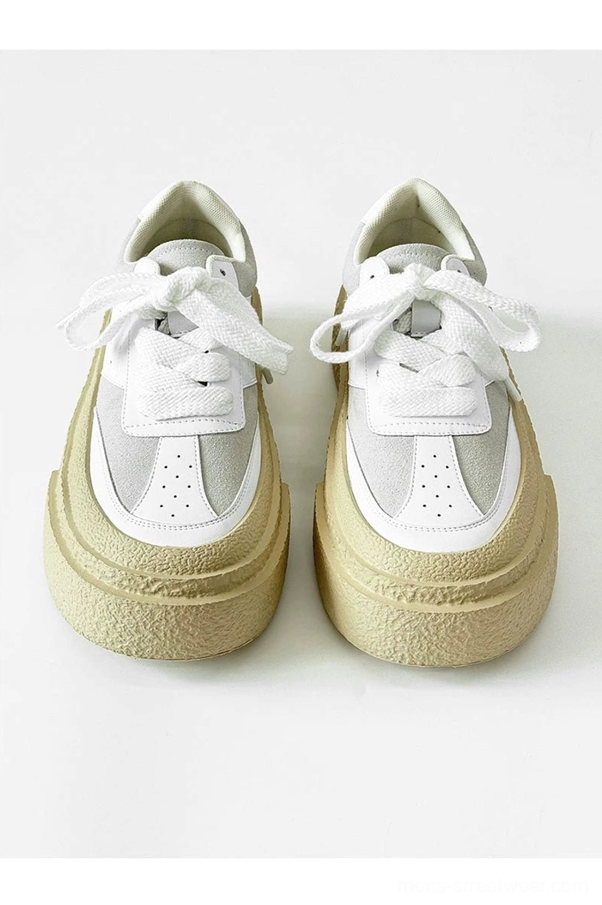 Oversized sole streetwear sneakers with a low-top silhouette and bold platform proportions