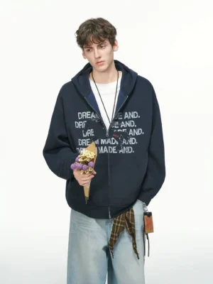 Navy blue oversized statement graphic full-zip streetwear hoodie front view with white typography print