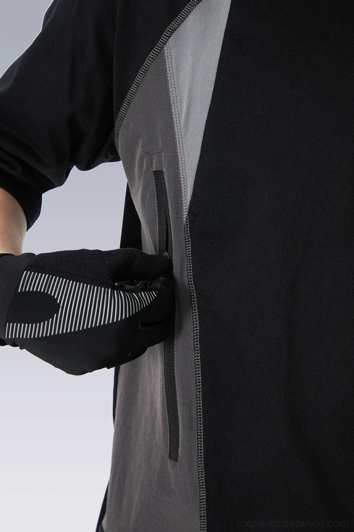 Additional product view of the oversized techwear panel T-shirt featuring a black and grey utility streetwear design