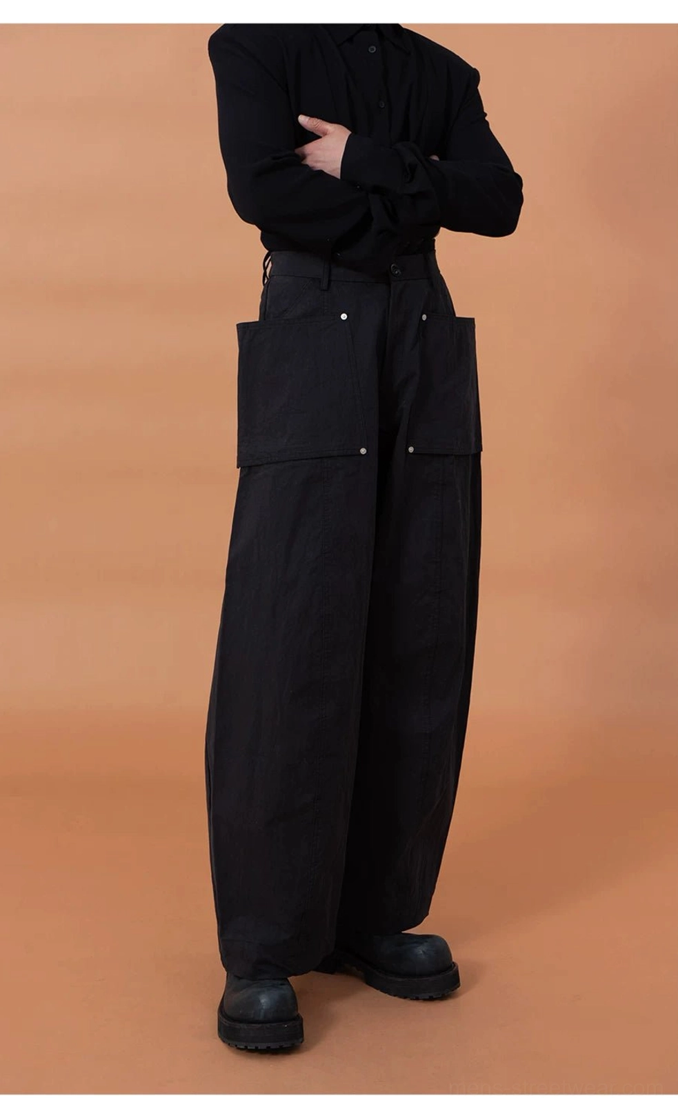 Oversized utility cargo pod pants product view highlighting the wide balloon-leg silhouette, oversized cargo pockets, and modern streetwear construction