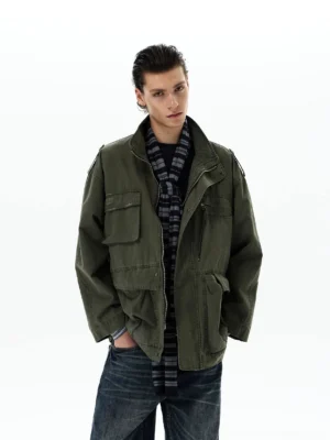 Army green oversized utility field jacket styled with a checked scarf and wide washed denim jeans in a Korean streetwear outfit