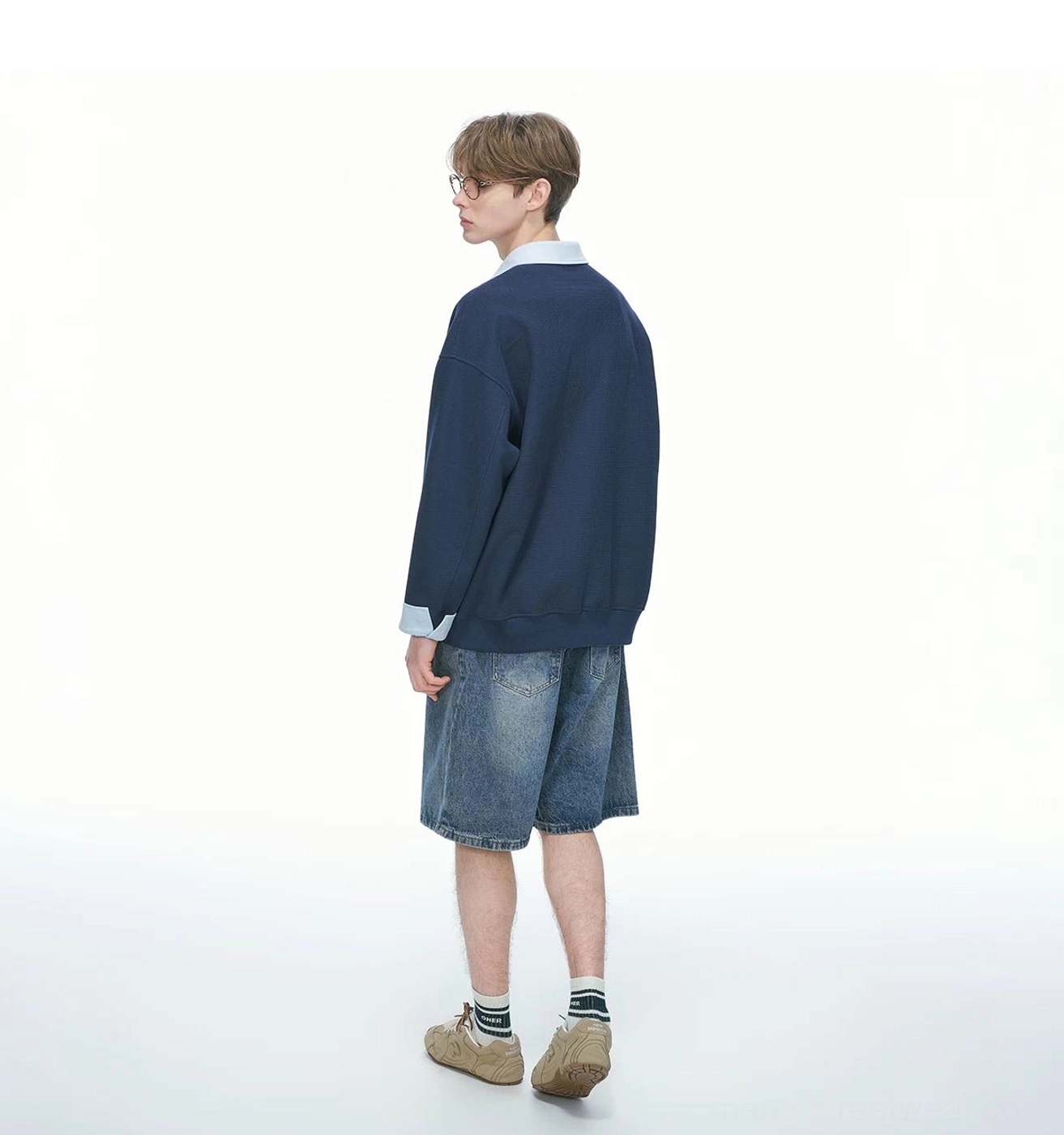 Oversized varsity rugby top with contrast collar and cuffs soft mid-weight knit fabric and understated collegiate styling