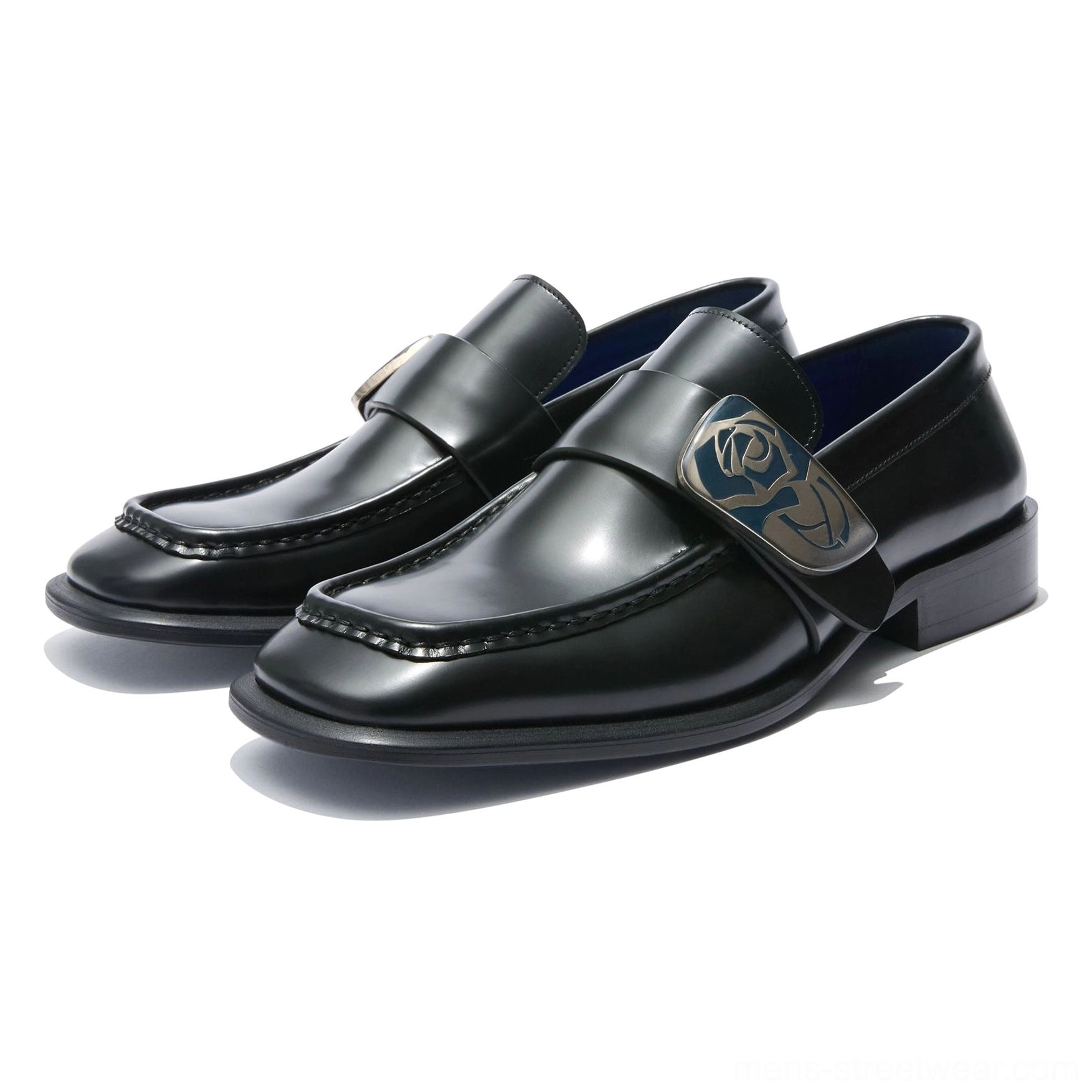 Pair of black rose crest leather loafers with polished finish square toe decorative edge stitching and blue lining