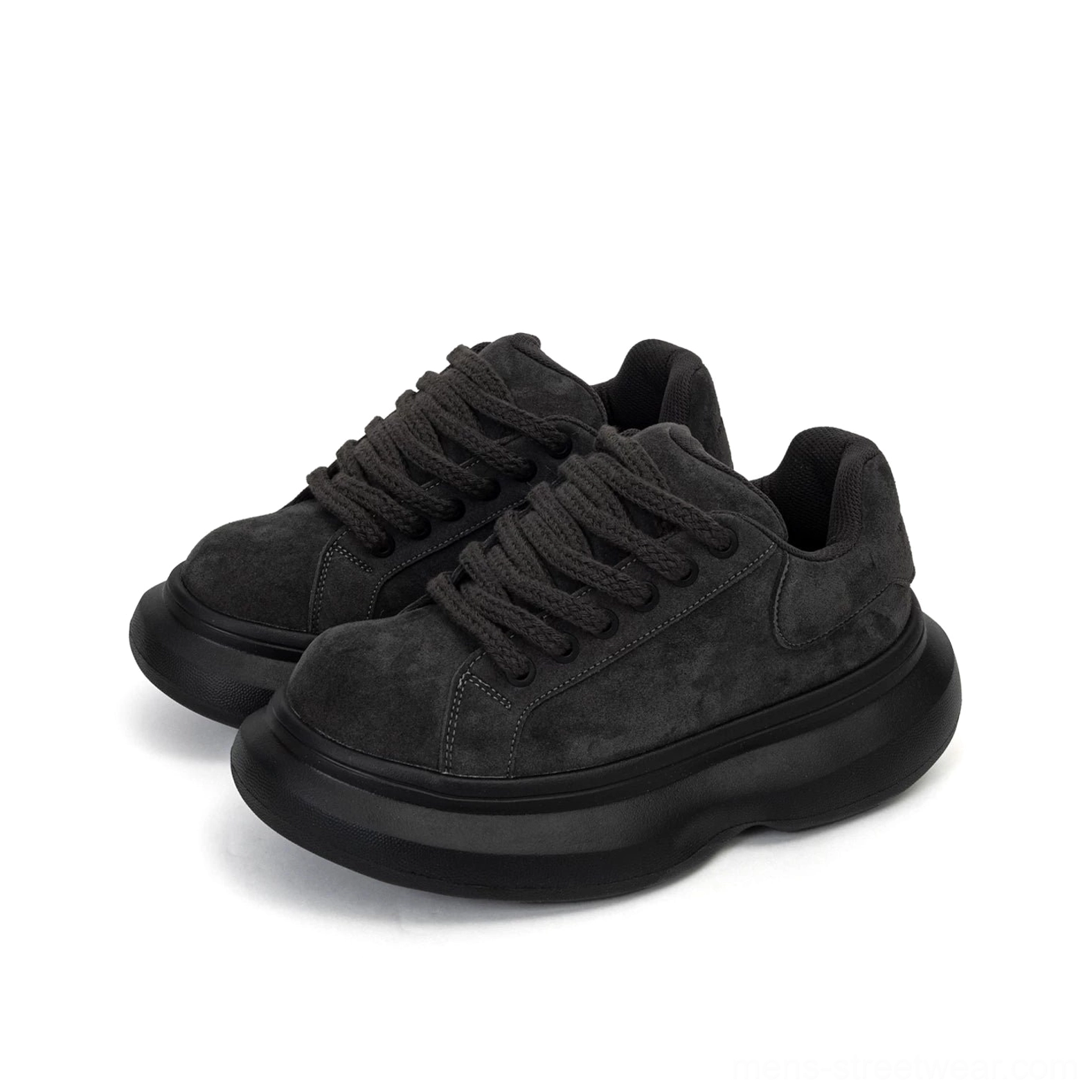Pair of black suede chunky platform sneakers displayed from the front angle with oversized outsole and minimalist low-top lace-up design