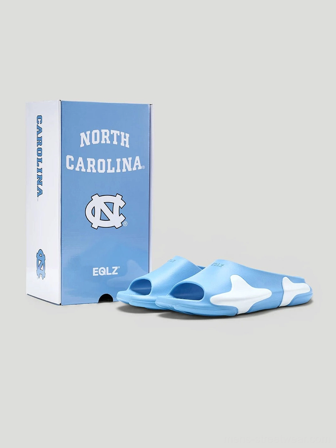 Pair of blue and white molded open-toe streetwear slides shown in a side-by-side display