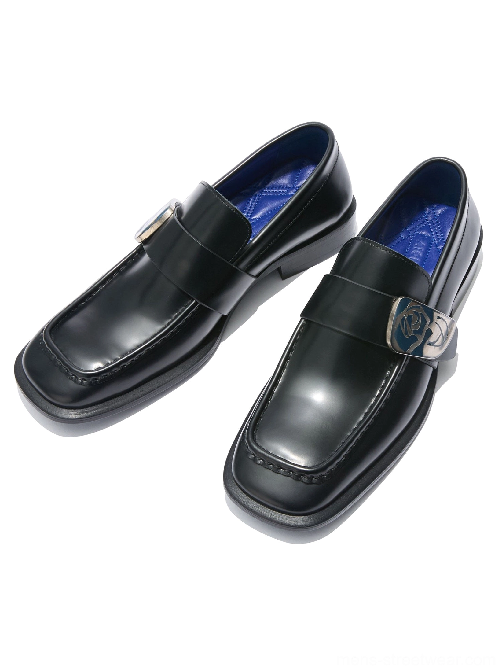Pair of polished black leather loafers with rose-shaped metal buckles square toes and blue inner lining