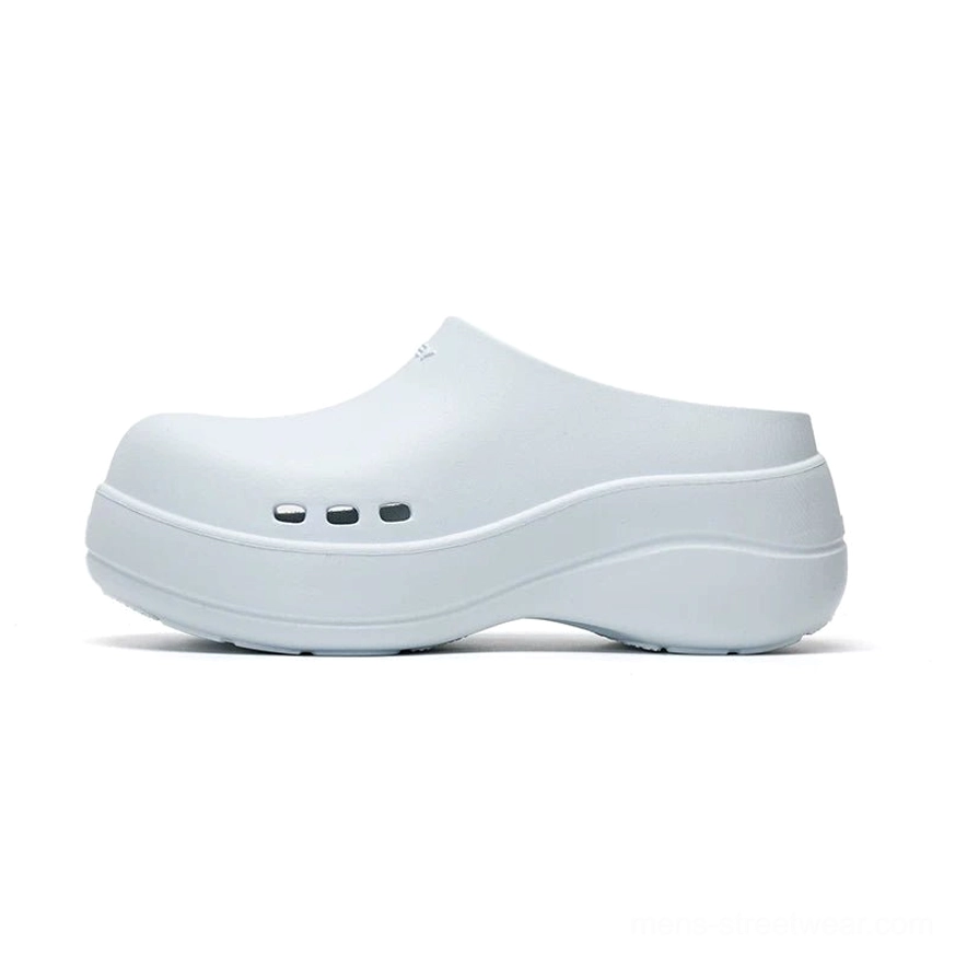 Pale blue Midnight Wave platform clogs with soft matte finish, rounded closed toe, three side vents and chunky wedge platform outsole for East Asian streetwear styling