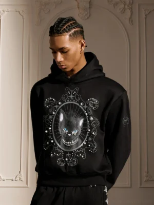 Pearl embellished mystic cat oversized gothic streetwear hoodie front view on male model