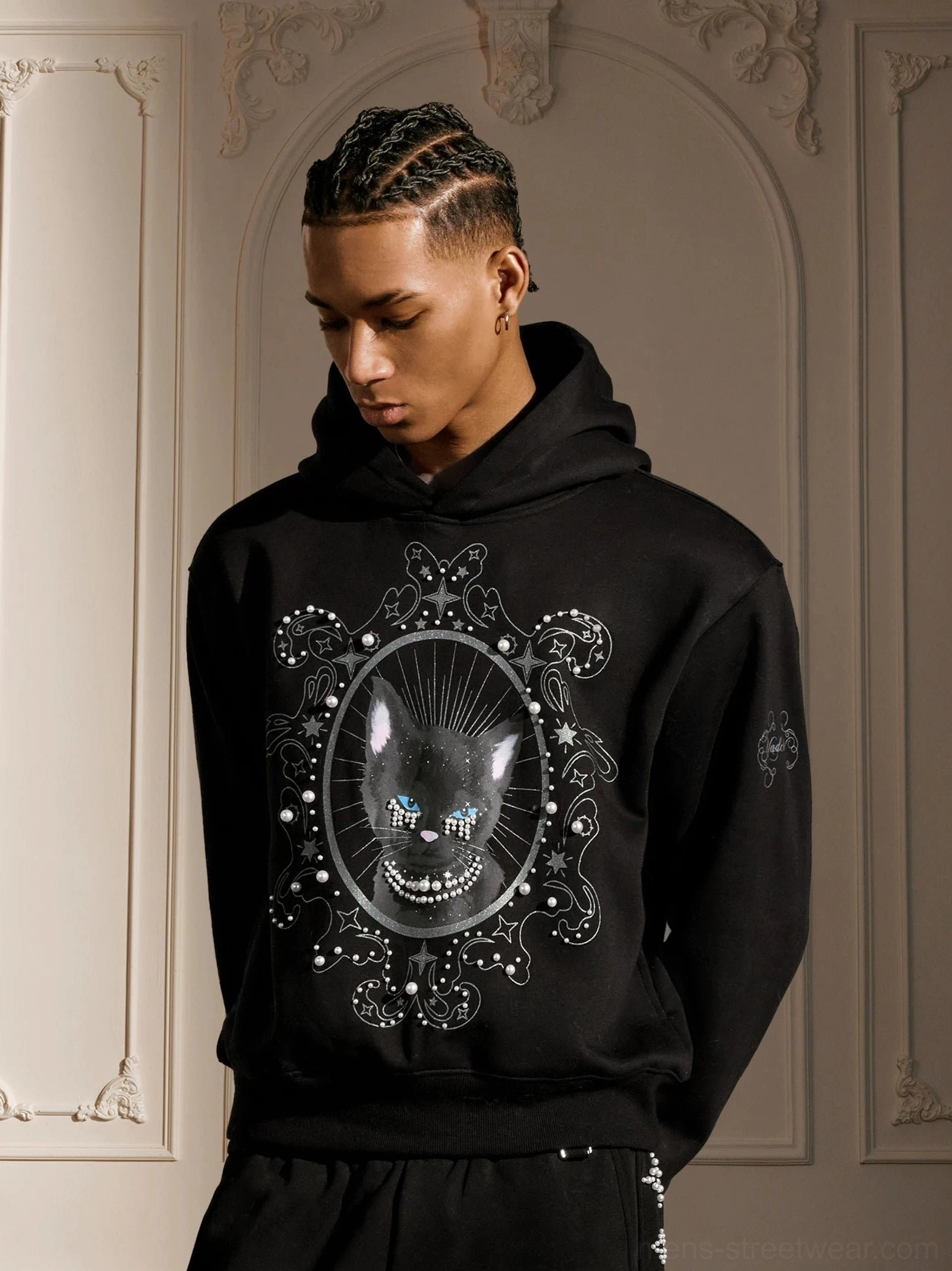 Pearl embellished mystic cat oversized gothic streetwear hoodie front view on male model