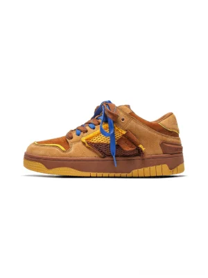 Brown perforated dual-lace platform sneaker with blue laces yellow mesh vamp panel and chunky rubber outsole