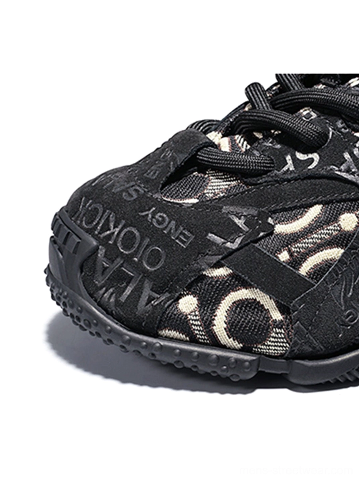 Pink chunky dad sneaker design with tonal embroidery, suede-effect overlays, patterned side panels, and a deep athletic rubber sole