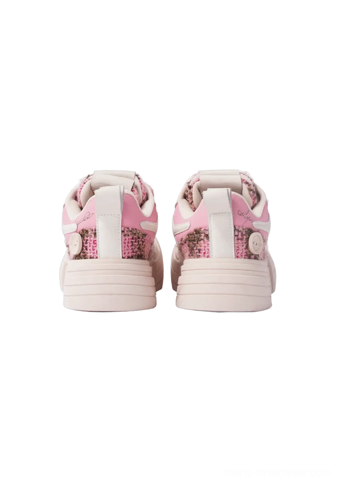 Back studio view of pink chunky platform sneakers showing heel badge pull tab and matching pink outsole