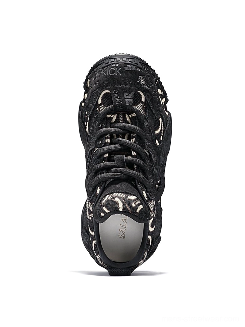 Fashion streetwear view of pink embroidered dad sneakers designed with a bold layered sole, textured overlays, and contemporary Seoul-inspired proportions